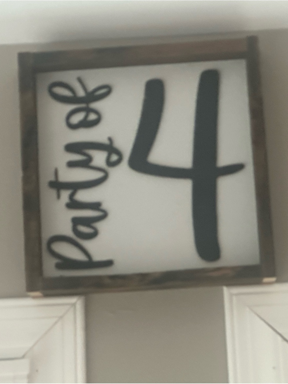 Framed "party of 4" Wall Sign in White and Black